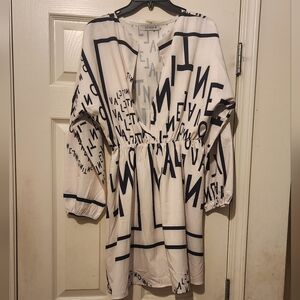 Shirt Dress Open Front. Elastic In The Waist. 19 1/2 Inches From Waist To Hem.